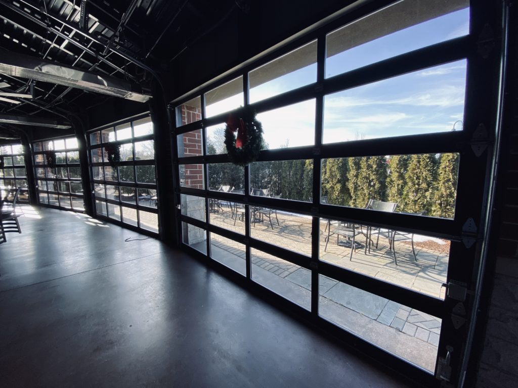 Interior view of glass overhead garage doors from our lemont, il job site.